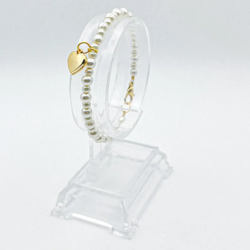 Pulsera de perlas con dije ✨