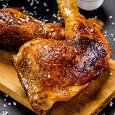 Pollo asado en salsa especiada