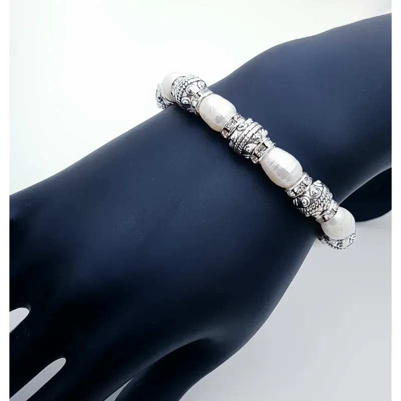 Pulsos de perlas de cultivo.