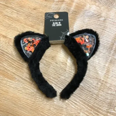 Cintillo con orejitas y lentejuelas