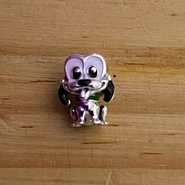Charm de Pluto