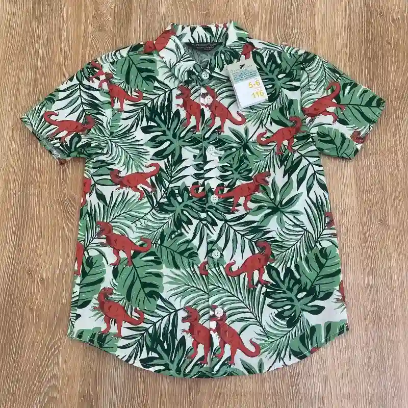 Camisa tropical con dinosaurios color verde