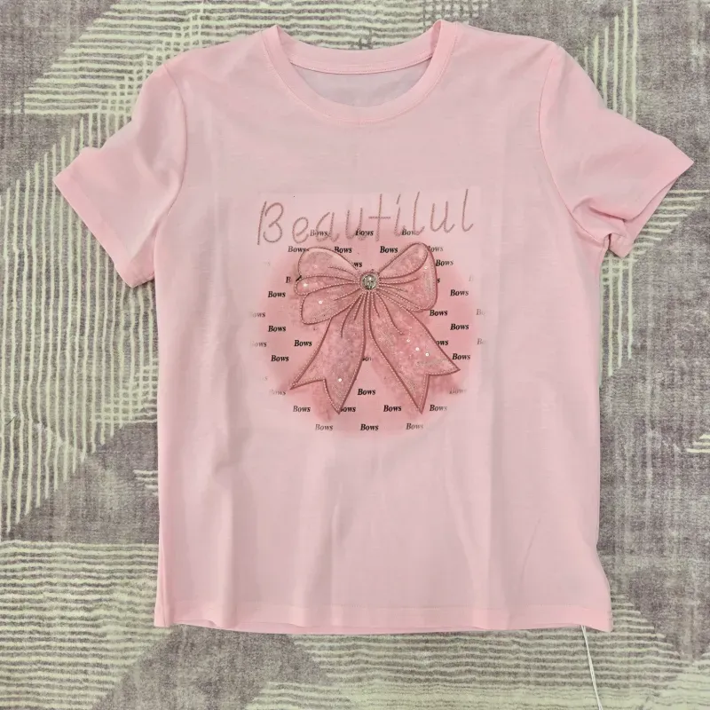 Pulover rosado con lazo