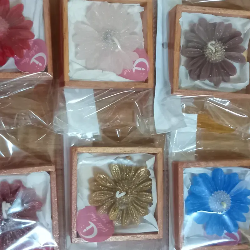 Margaritas en cajitas de madera