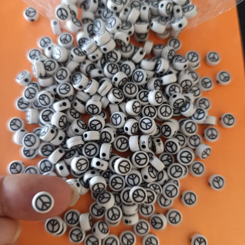 Cuentas plásticas con signo de la paz ️