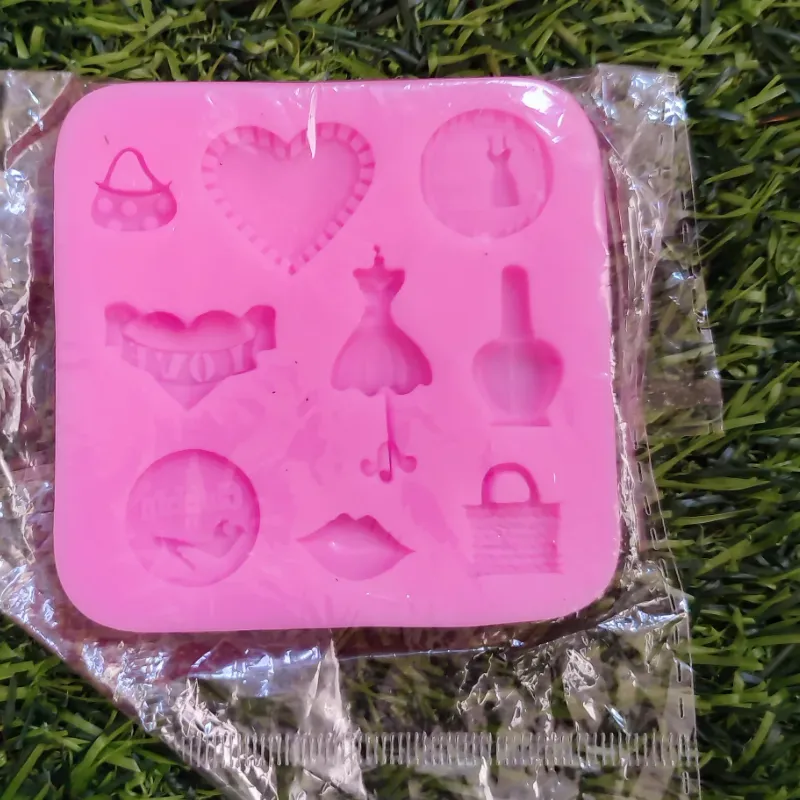 Molde accesorios de bebé, niña y caramelos