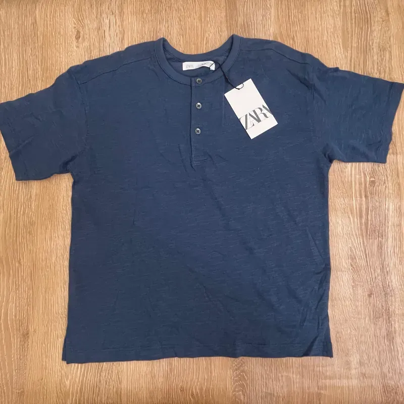 Pulóver con botones color azul oscuro