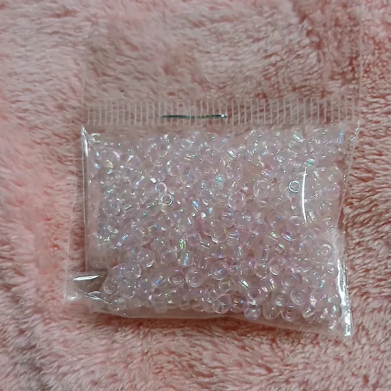 Mostacillas rosa claro tornasol transparente