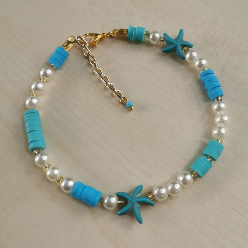 Tobillera de fimos, perlas blancas y estrellas de mar