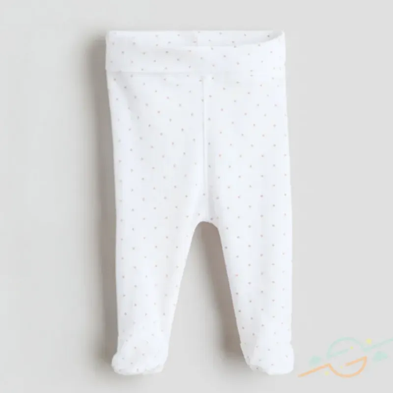 Pantalón blanco puntos rosa enterizo H&M