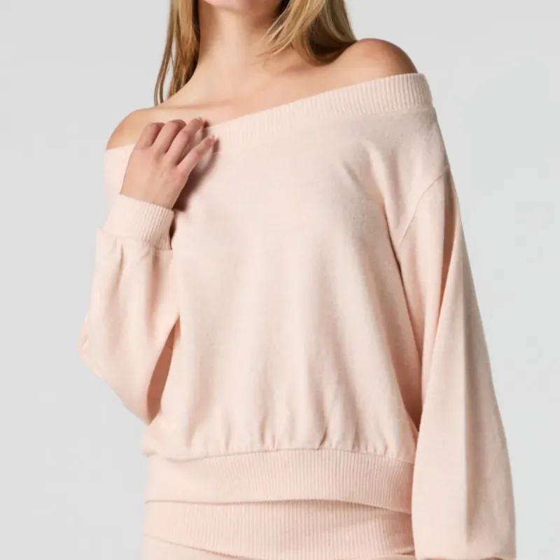 Abriguito naranja claro de hombros descubiertos