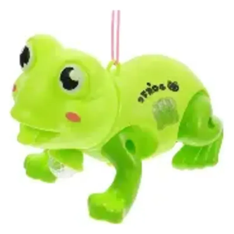 JUGUETE MECANICO EN FORMA DE RANA.
