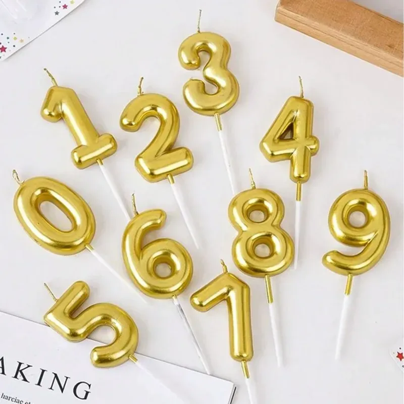 Velas de numeros doradas