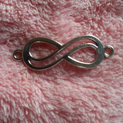 Dije Conector infinito doble