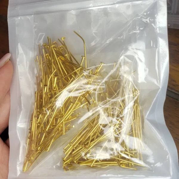 Palitos para aretes dorados