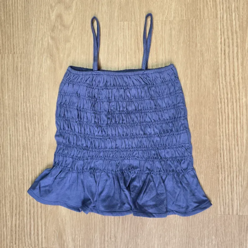 Blusa azul con vuelos