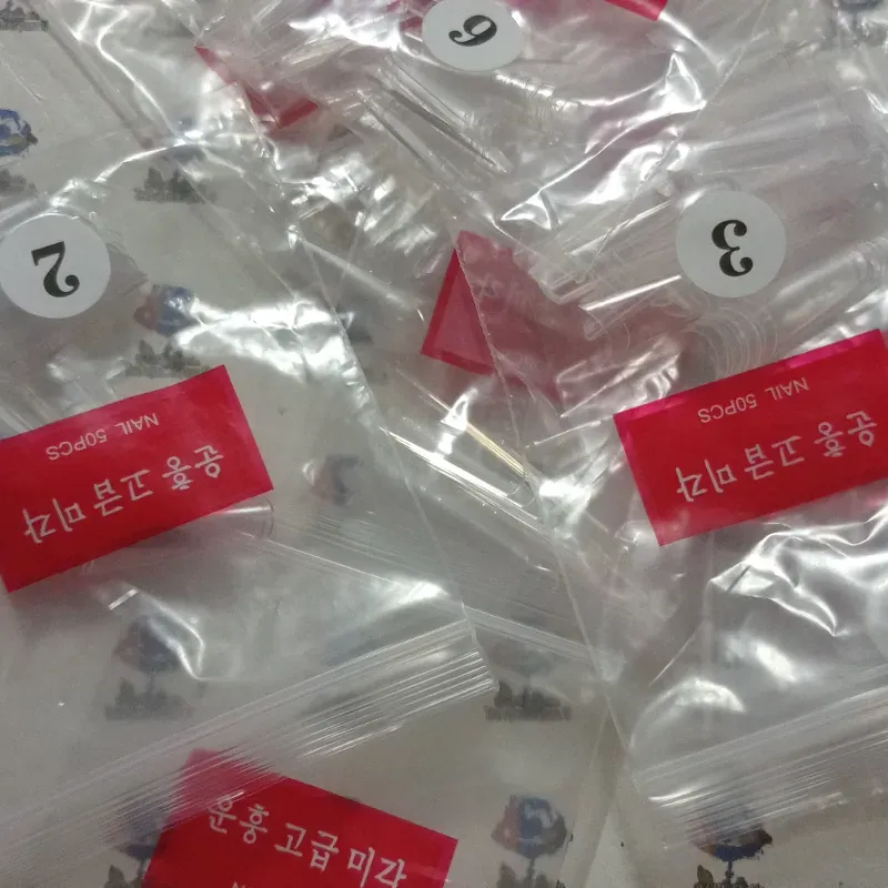 Paqueticos de 50 uñas