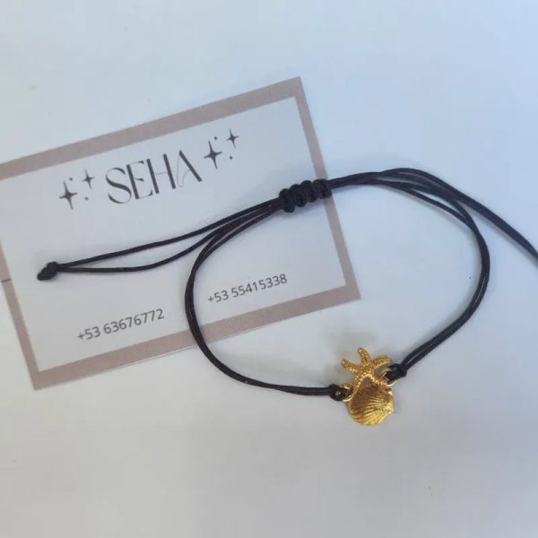 Pulsera de hilo con dije