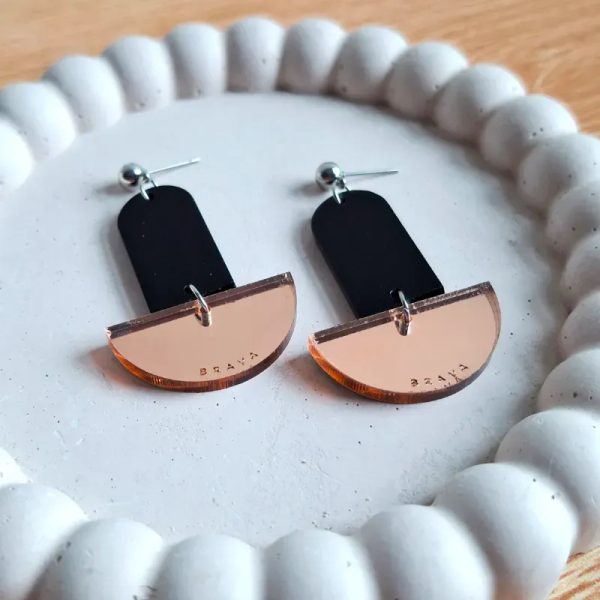 Péndulo negro y oro rosa