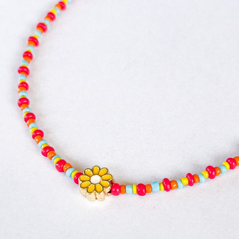 Collar con cuentas de vidrio y dije