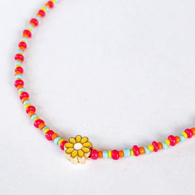 Collar con cuentas de vidrio y dije