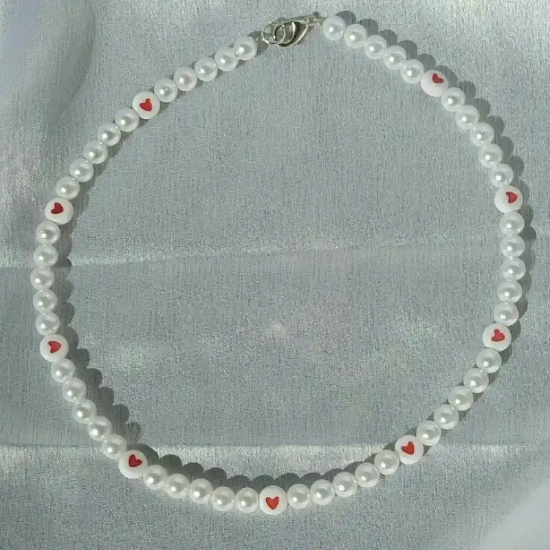 Collar de perlas con ❤