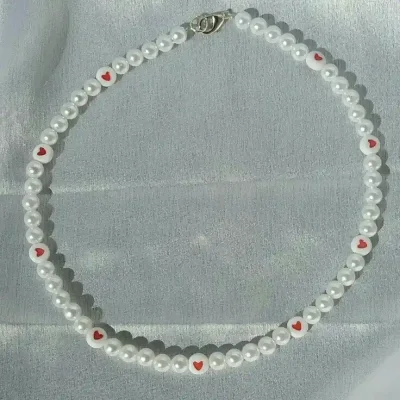 Collar de perlas con ❤