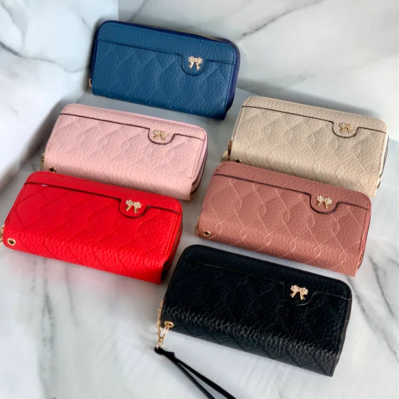 Monederos de doble zipper