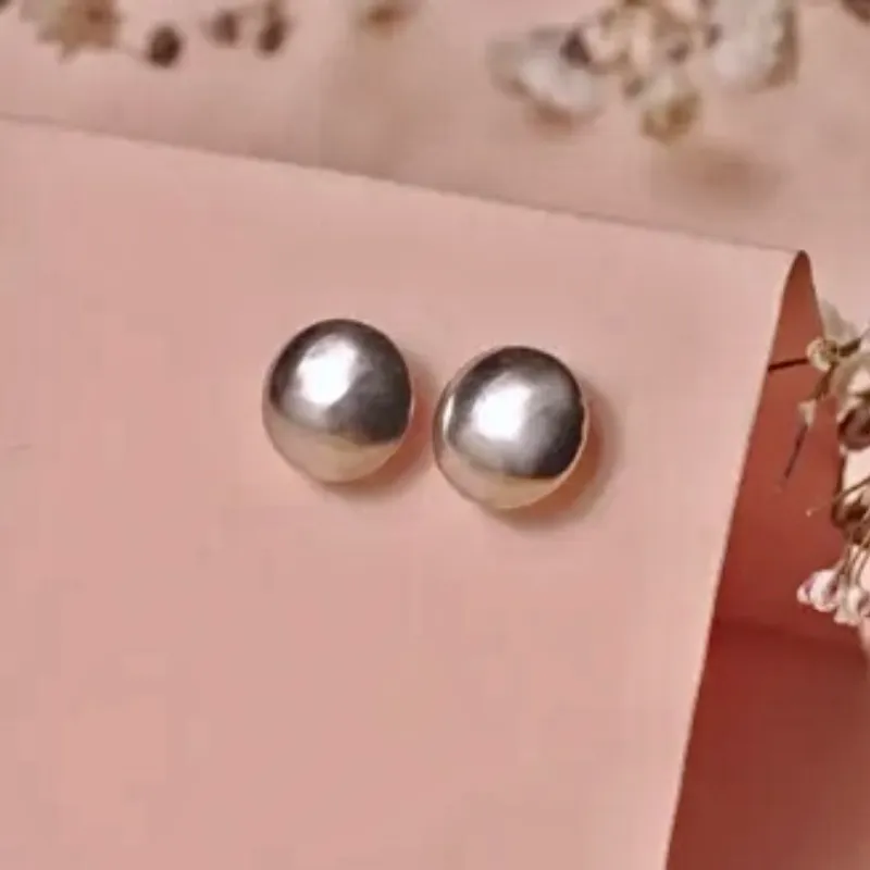 Aretes artesanales de botón