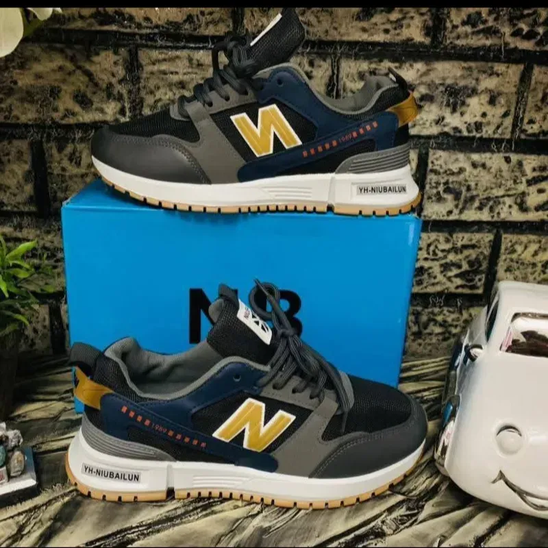 New balance gris oscuro