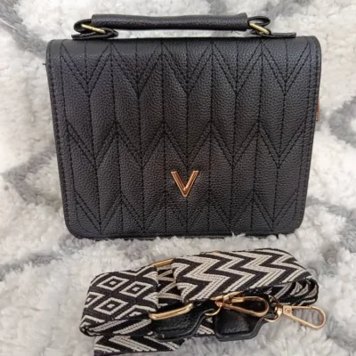 Cartera negra 10 USD