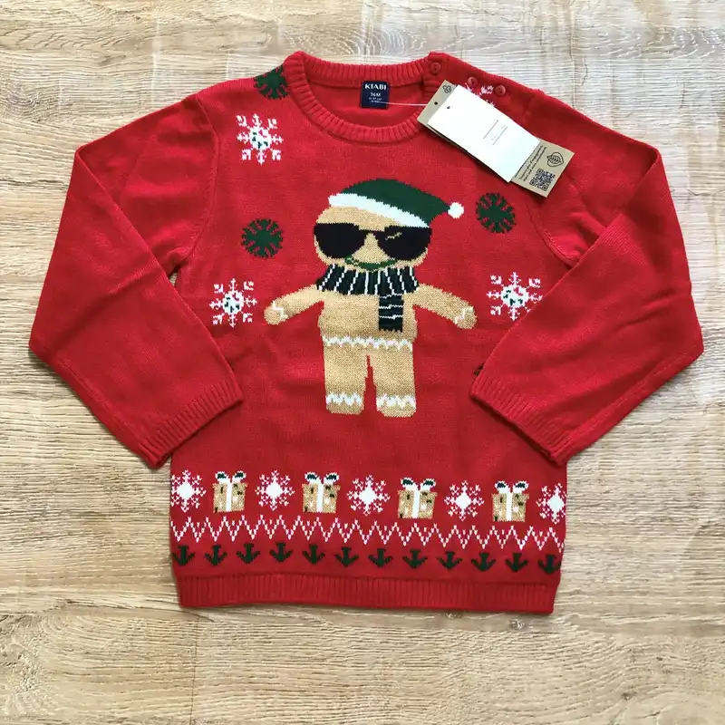 Abrigo rojo con galleta de jengibre