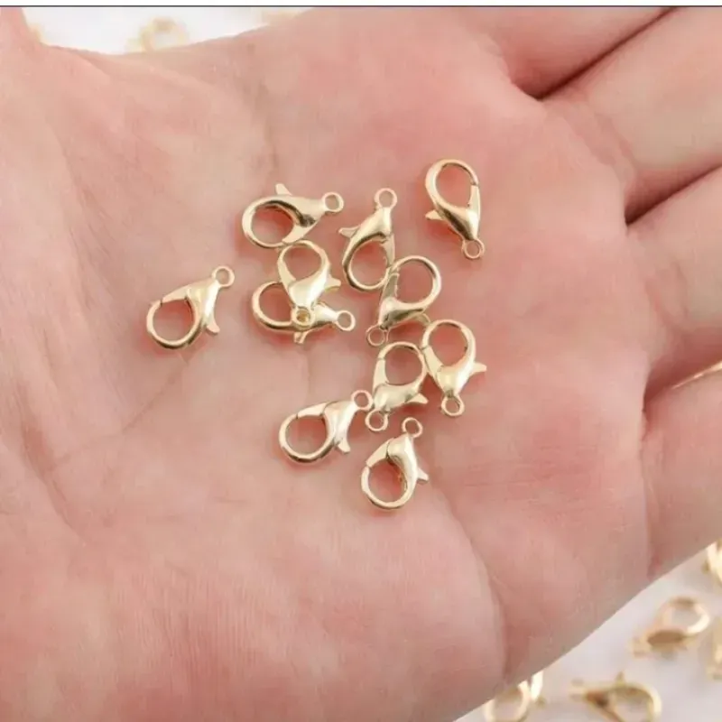 Cierres de perico dorados