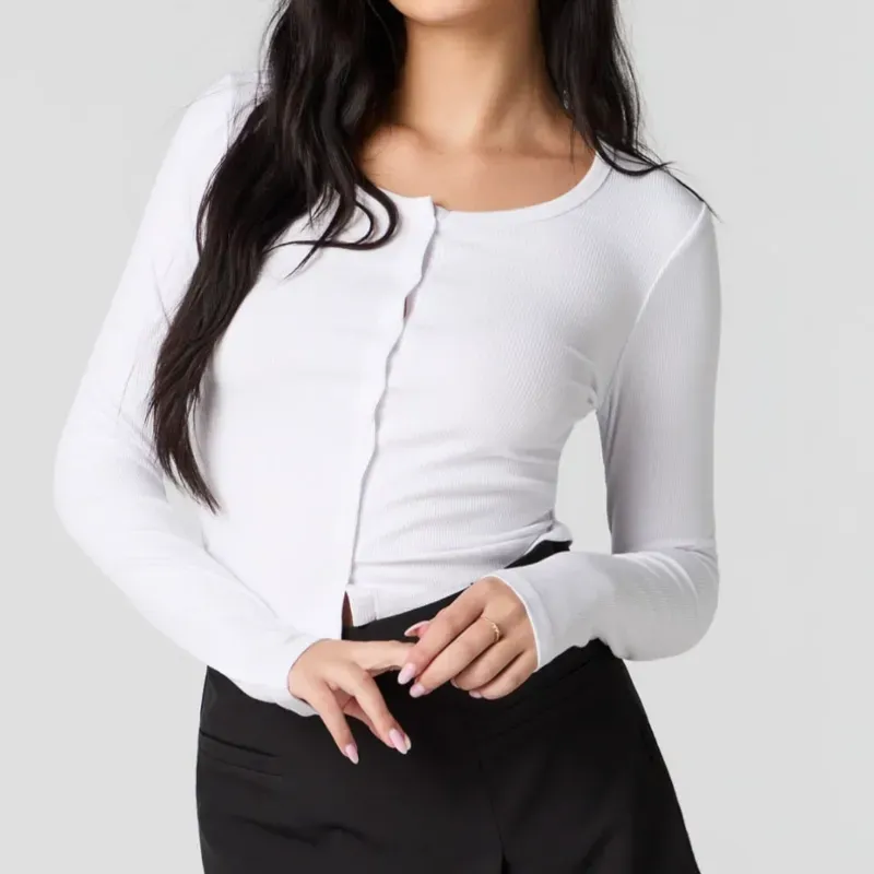 Abriguito blanco de botones