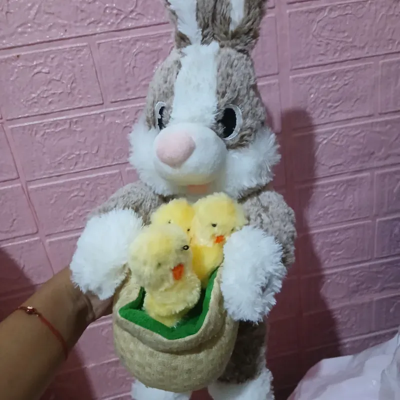 Peluche conejo que canta y baila