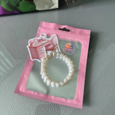 Pulsera corazones perlados