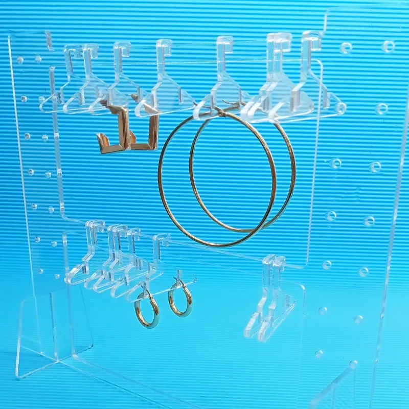 Expositor de aretes con percheros