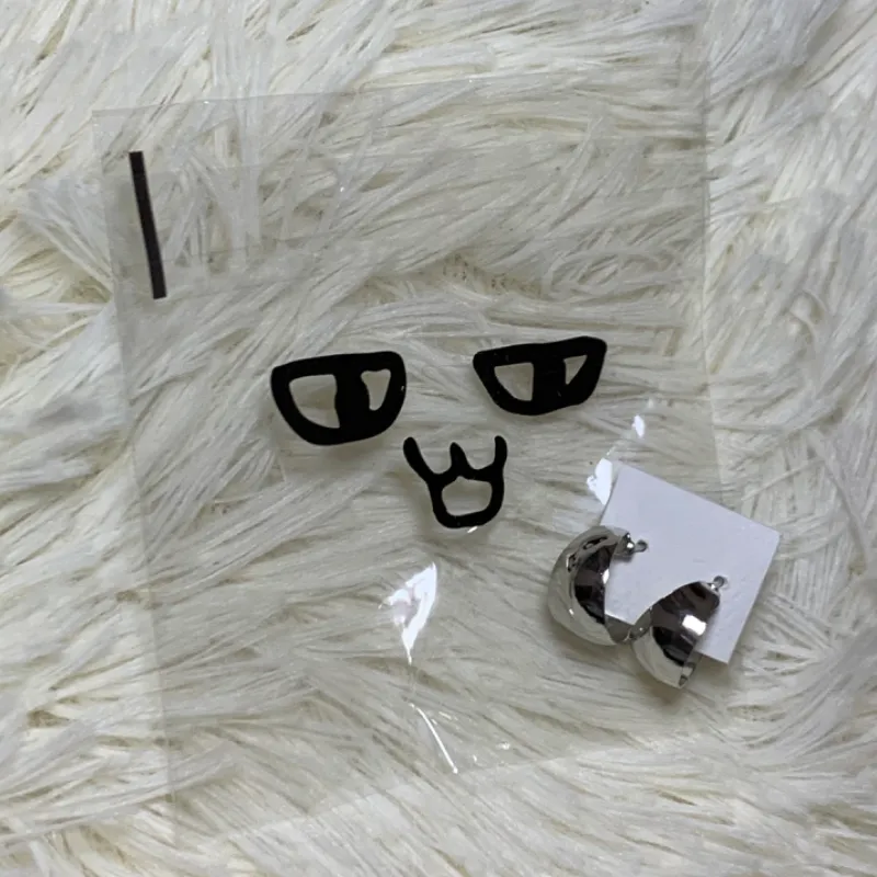 Aretes plateados, modelo #7. 