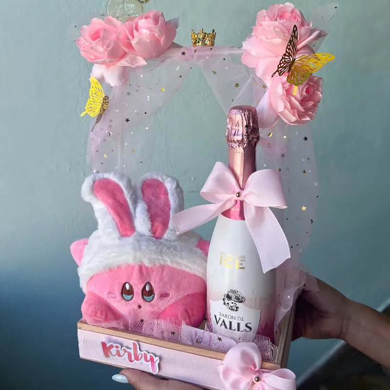 Caja con vino espumoso y peluche