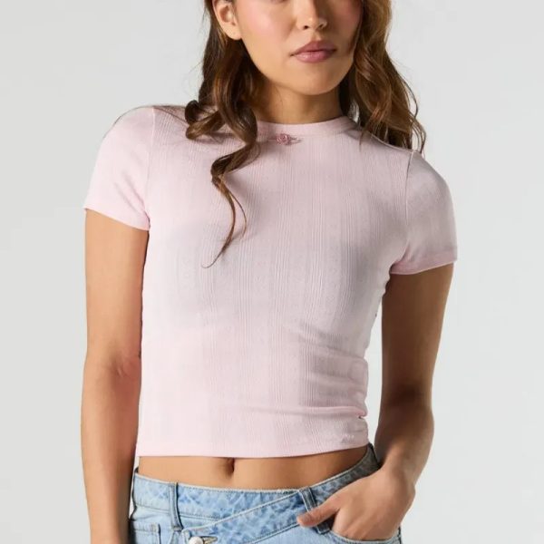 Top coquette rosa.