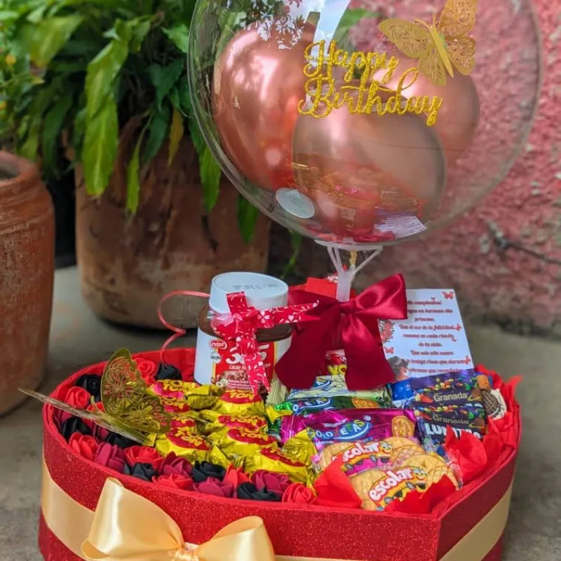 Corazón con golosinas