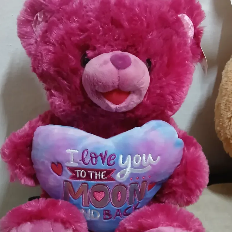 Peluche rosado con corazón
