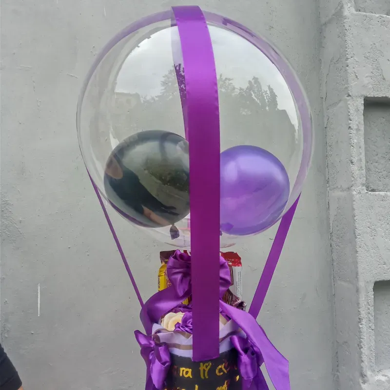 Caja de regalo con globos burbujas