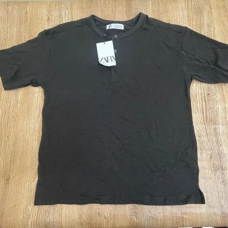 Pulóver son botones color negro