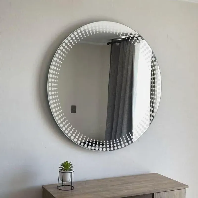 Espejo redondo con grabado