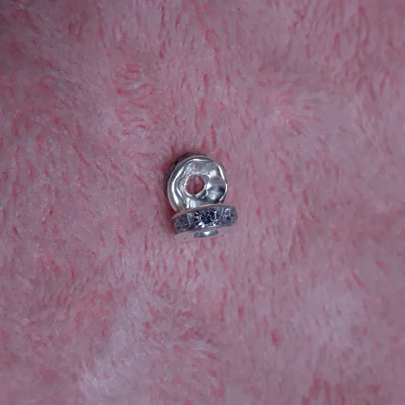 Separador de piedras plateado 6 mm