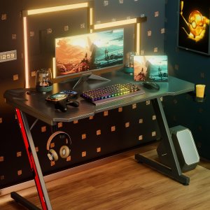 Mesa de Gamerz en forma de Z, superficie de fibra de carbono y gancho para auriculares (44 pulgadas, negro)