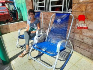 Pareja de sillones de suiza en distintos colores, rojos, verdes, azules